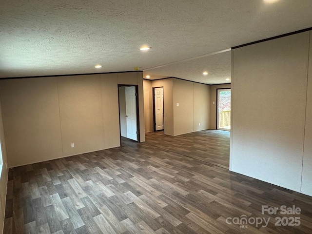 3162 Bear Trail Dr, Lenoir, NC 28645 - unfurnished room with wood finished floors, a textured ceiling, and recessed lighting