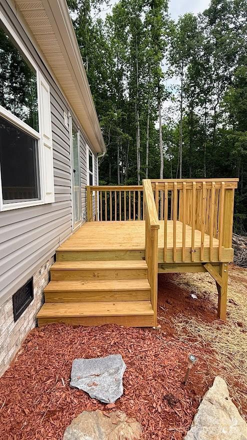 3162 Bear Trail Dr, Lenoir, NC 28645 - wooden terrace featuring view of scattered trees