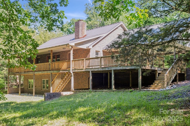 3090 Goblet Rd, Richburg, SC 29729 - back of house featuring stairs, a deck, brick siding, metal roof, and a chimney