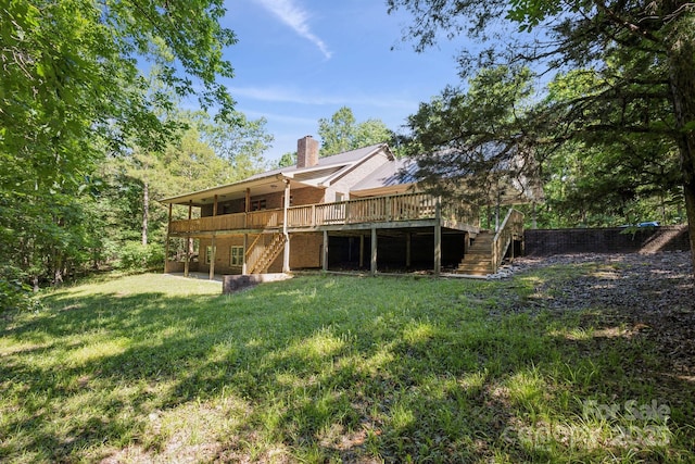 3090 Goblet Rd, Richburg, SC 29729 - rear view of house featuring stairs, a deck, a chimney, a lawn, and a patio