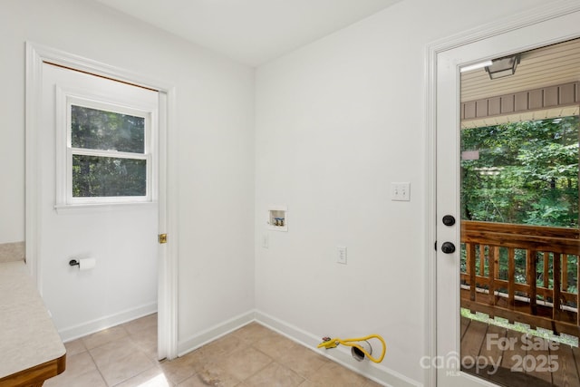 3090 Goblet Rd, Richburg, SC 29729 - laundry area featuring hookup for a washing machine, baseboards, and light tile patterned floors