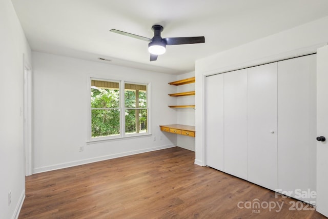 3090 Goblet Rd, Richburg, SC 29729 - unfurnished bedroom featuring wood finished floors, baseboards, and a closet