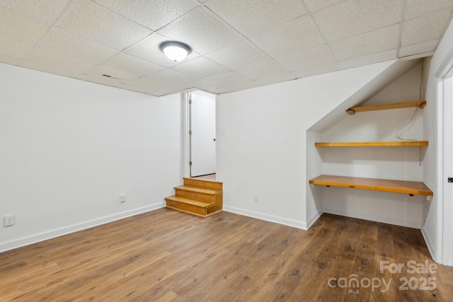 3090 Goblet Rd, Richburg, SC 29729 - finished basement featuring a paneled ceiling, hardwood / wood-style floors, baseboards, and stairway