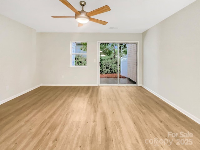 14123 Tranters Creek Ln, Charlotte, NC 28273 - unfurnished room featuring light wood-style floors, baseboards, and a ceiling fan