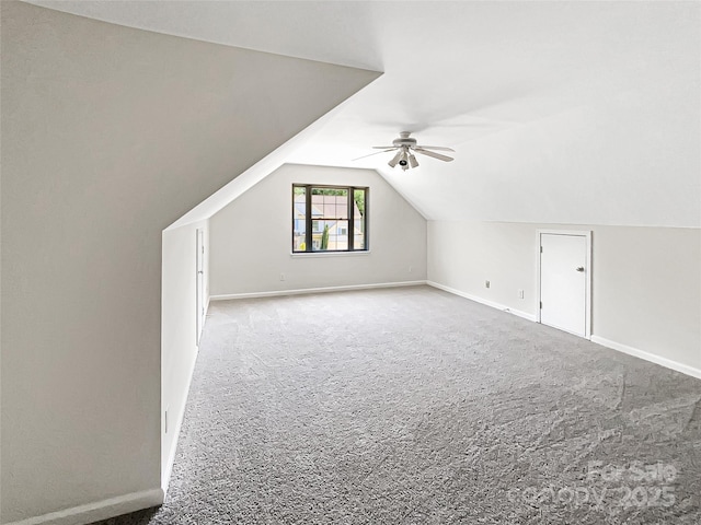 6413 Fillian Ln, Charlotte, NC 28269 - bonus room featuring carpet flooring, a ceiling fan, vaulted ceiling, and baseboards