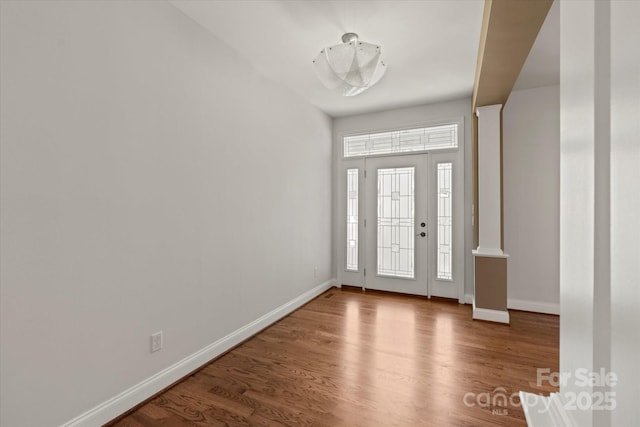 1819 Brompton Ct, Newton, NC 28658 - foyer entrance featuring wood finished floors and decorative columns