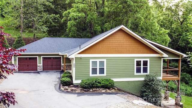 171 View Ridge Parkway, Leicester, NC 28748 - view of front of home featuring asphalt driveway and an attached garage