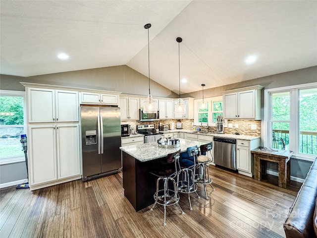 171 View Ridge Parkway, Leicester, NC 28748 - kitchen featuring stainless steel appliances, a center island, dark wood-type flooring, tasteful backsplash, and lofted ceiling