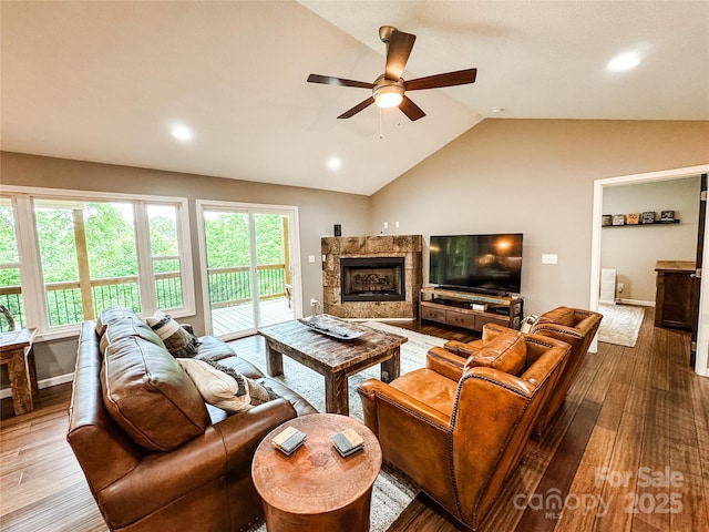 171 View Ridge Parkway, Leicester, NC 28748 - living area featuring hardwood / wood-style flooring, a ceiling fan, lofted ceiling, a high end fireplace, and recessed lighting