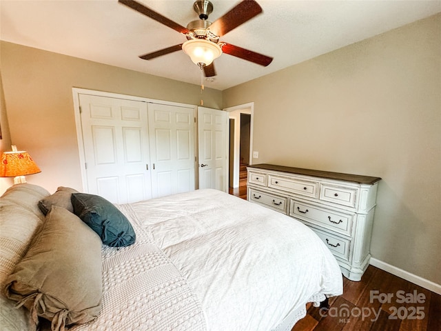 171 View Ridge Parkway, Leicester, NC 28748 - bedroom with dark wood-style floors, baseboards, a closet, and a ceiling fan