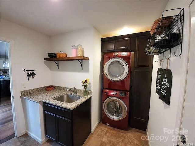 171 View Ridge Parkway, Leicester, NC 28748 - laundry area with stacked washer / dryer, cabinet space, baseboards, and bar with sink