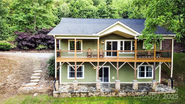 171 View Ridge Parkway, Leicester, NC 28748 - back of property featuring roof with shingles and a patio area