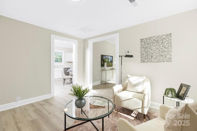 210 E 5th Ave, Gastonia, NC 28054 - living area with light wood finished floors and baseboards