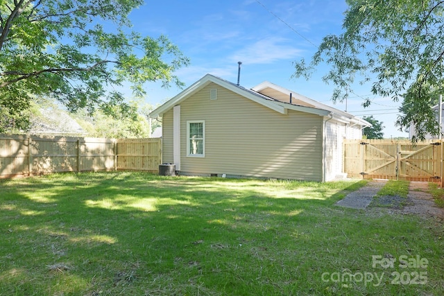 210 E 5th Ave, Gastonia, NC 28054 - rear view of property with a gate and central AC unit