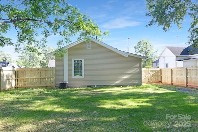 210 E 5th Ave, Gastonia, NC 28054 - back of house featuring crawl space and central air condition unit