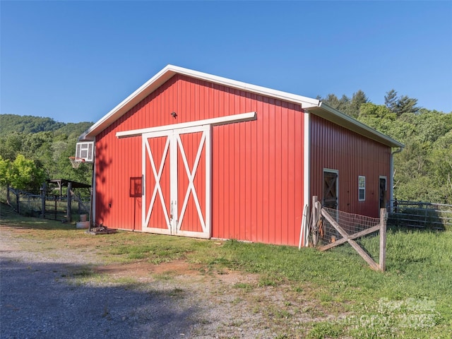 78 Hardin Ln, Clyde, NC 28721 - view of outbuilding with a forest view