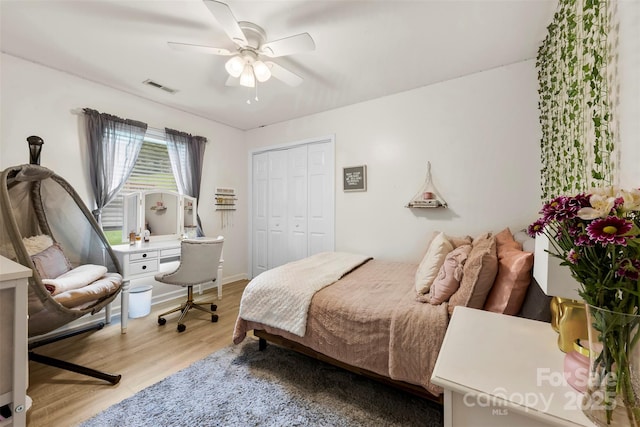122 Pratt St, Belmont, NC 28012 - bedroom with light wood finished floors, a closet, and a ceiling fan