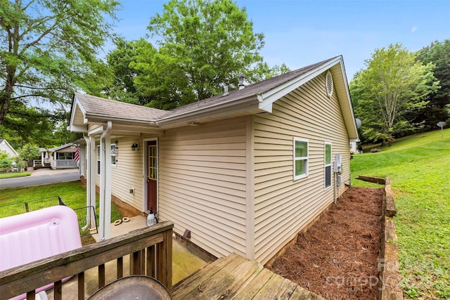 122 Pratt St, Belmont, NC 28012 - view of side of property with a lawn and a shingled roof