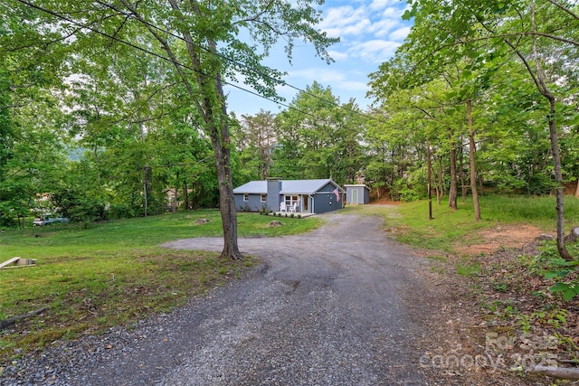 28 Reynolds School Rd, Asheville, NC 28803 - single story home featuring gravel driveway and a front yard