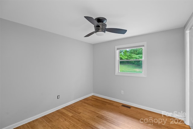 28 Reynolds School Rd, Asheville, NC 28803 - spare room featuring baseboards, light wood-style floors, and ceiling fan