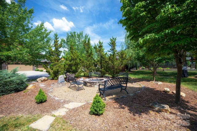 76 Creekside View Dr, Asheville, NC 28804 - view of yard with a fire pit