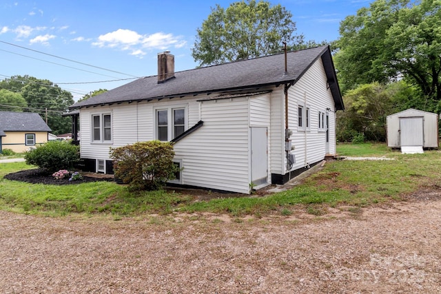 1406 Upper Enochville Rd, Kannapolis, NC 28081 - view of side of home with a chimney and roof with shingles