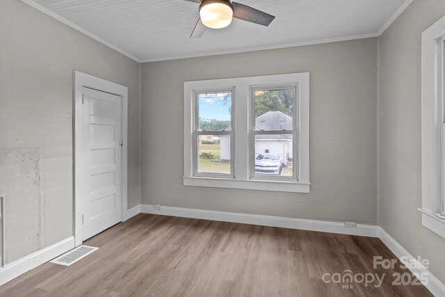 1406 Upper Enochville Rd, Kannapolis, NC 28081 - unfurnished room with wood finished floors, a ceiling fan, crown molding, and baseboards