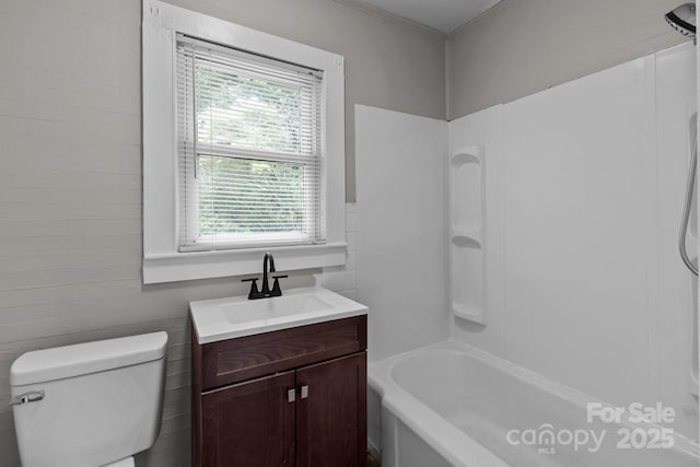 1406 Upper Enochville Rd, Kannapolis, NC 28081 - bathroom with vanity, toilet, ornamental molding, and shower / bathtub combination