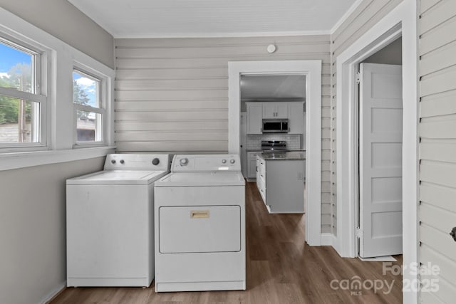 1406 Upper Enochville Rd, Kannapolis, NC 28081 - washroom with washer and dryer, dark wood-style flooring, and baseboards