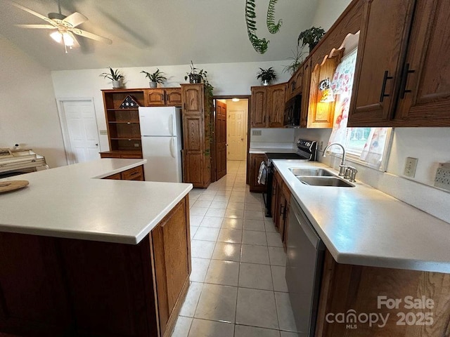 4574 Ivy Run Ln, Denver, NC 28037 - kitchen featuring freestanding refrigerator, black microwave, a sink, stainless steel dishwasher, and range with electric stovetop