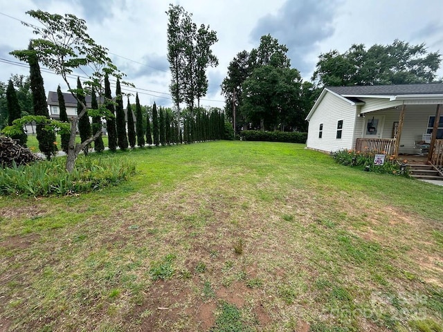 4574 Ivy Run Ln, Denver, NC 28037 - view of green lawn with a porch