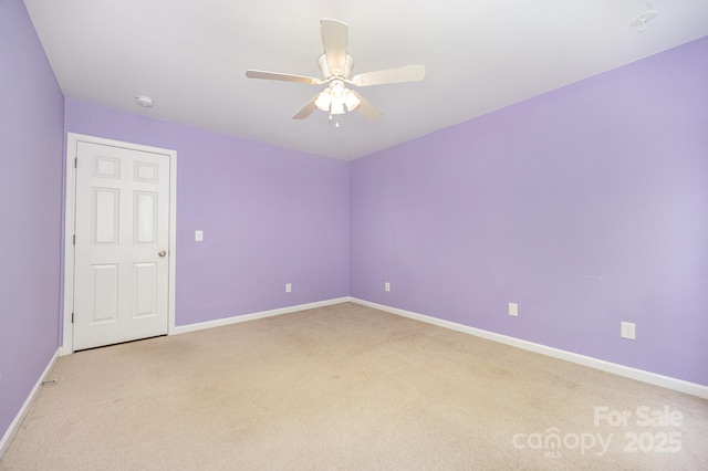 426 Carriage Ln, Linwood, NC 27299 - unfurnished room with light carpet, ceiling fan, and baseboards