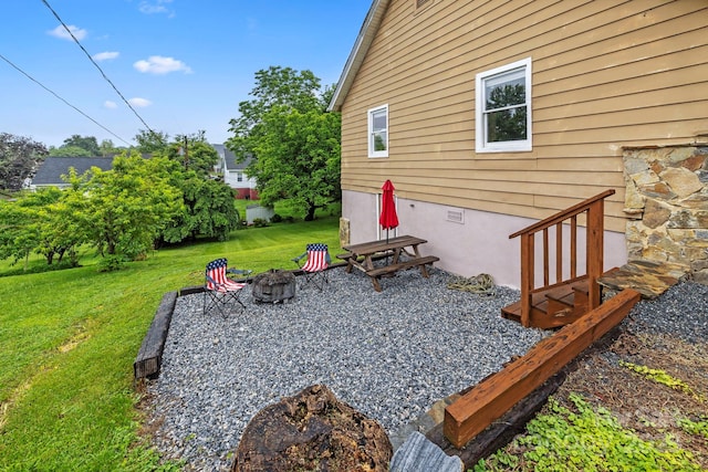61 First St, Marion, NC 28752 - view of grassy yard featuring a fire pit