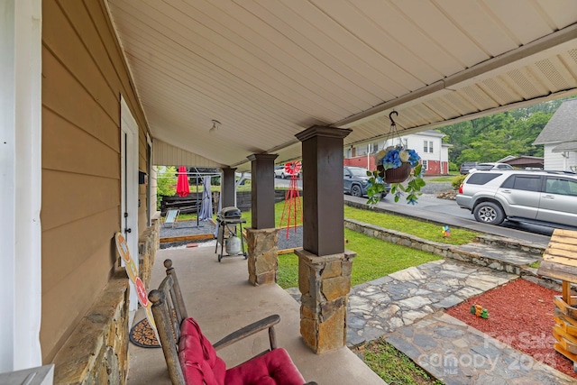 61 First St, Marion, NC 28752 - porch featuring a grill