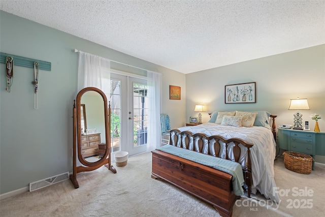 16 Fieldstone Ct, Arden, NC 28704 - carpeted bedroom featuring access to outside, french doors, and a textured ceiling