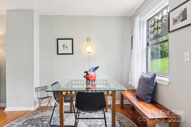 615 Biltmore Ave Unit K2, Asheville, NC 28803 - dining room with wood finished floors, baseboards, and an accent wall