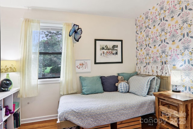 615 Biltmore Ave Unit K2, Asheville, NC 28803 - bedroom featuring multiple windows, wood finished floors, and baseboards