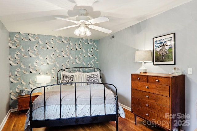 615 Biltmore Ave Unit K2, Asheville, NC 28803 - bedroom featuring baseboards, wood finished floors, and ceiling fan