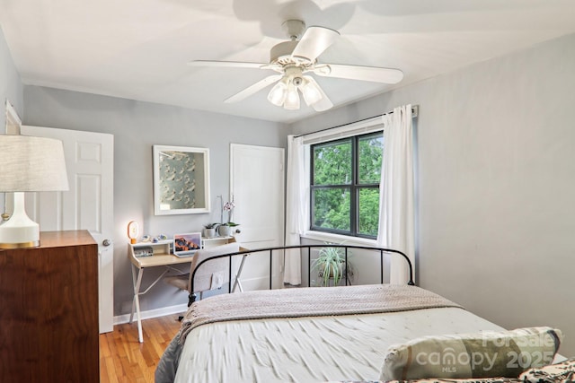 615 Biltmore Ave Unit K2, Asheville, NC 28803 - bedroom with wood finished floors and a ceiling fan
