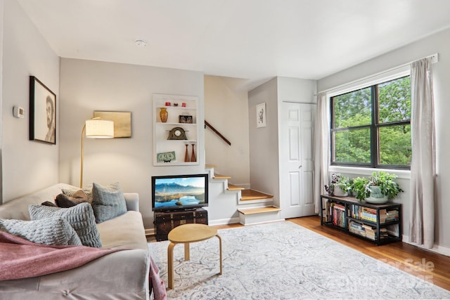 615 Biltmore Ave Unit K2, Asheville, NC 28803 - living room featuring stairs, wood finished floors, and baseboards