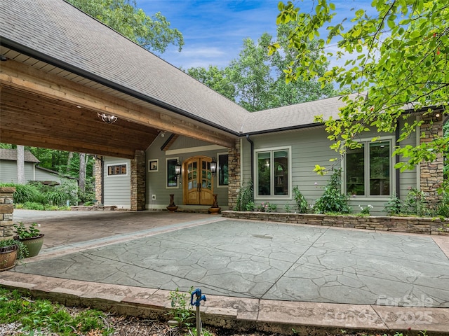 105 Blackberry Ln, Fairview, NC 28730 - rear view of property featuring french doors, a shingled roof, and driveway