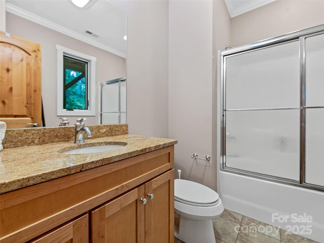 105 Blackberry Ln, Fairview, NC 28730 - full bath featuring crown molding, vanity, shower / bath combination with glass door, toilet, and tile patterned flooring