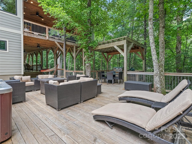 105 Blackberry Ln, Fairview, NC 28730 - deck featuring outdoor lounge area, a ceiling fan, a grill, and outdoor dining space
