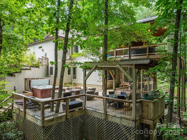 105 Blackberry Ln, Fairview, NC 28730 - wooden terrace featuring a hot tub, stairs, and an outdoor living space