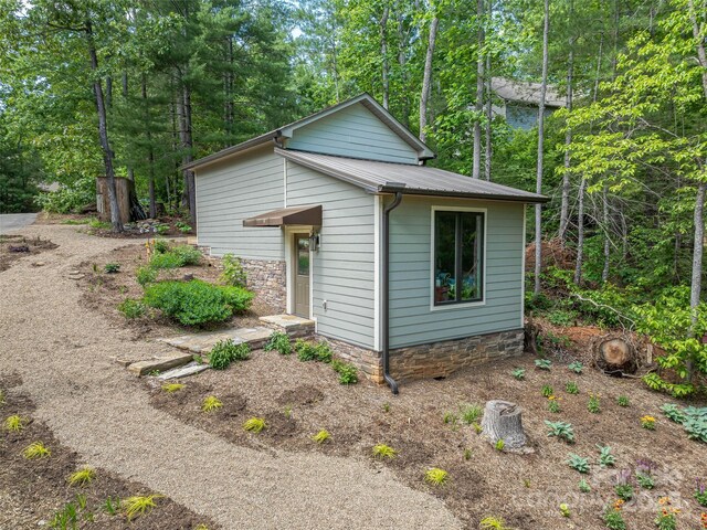 105 Blackberry Ln, Fairview, NC 28730 - view of side of property featuring metal roof
