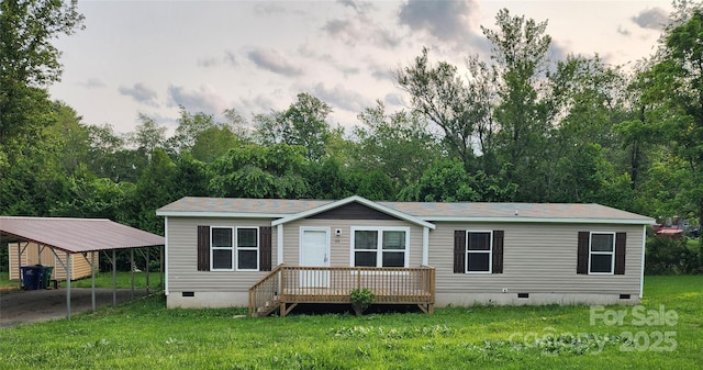 22 Ridge Top Acres Rd, Candler, NC 28715 - manufactured / mobile home featuring crawl space, a carport, and a front lawn