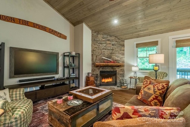 45 Boulder Creek Ln Unit 28, Tuckasegee, NC 28783 - living area with wood ceiling, lofted ceiling, a stone fireplace, and wood finished floors