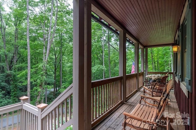 45 Boulder Creek Ln Unit 28, Tuckasegee, NC 28783 - sunroom / solarium featuring a forest view
