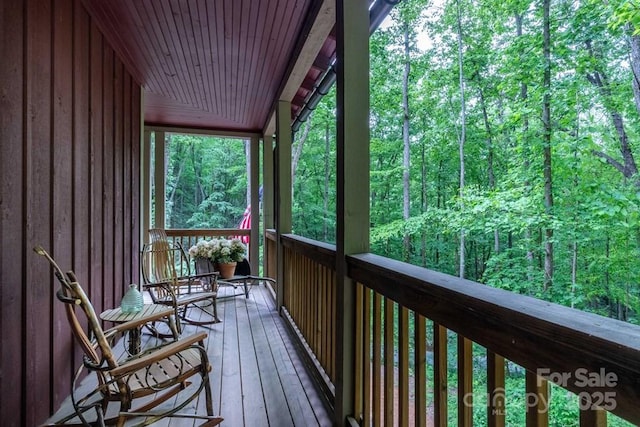 45 Boulder Creek Ln Unit 28, Tuckasegee, NC 28783 - wooden terrace with a wooded view