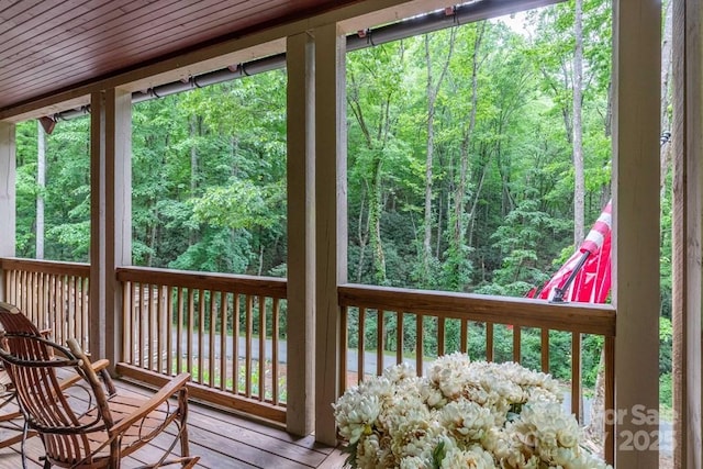 45 Boulder Creek Ln Unit 28, Tuckasegee, NC 28783 - deck featuring a view of trees